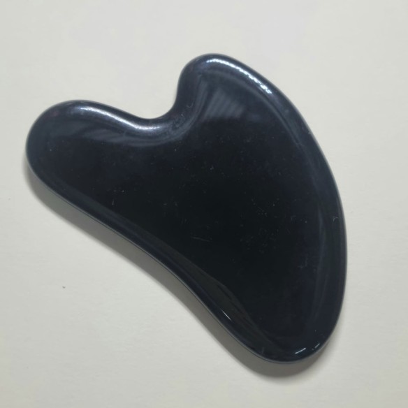 Gua sha pie de obsidiana negra