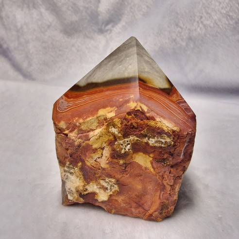 Polychrome jasper polished point at Cristalljoia Barcelona