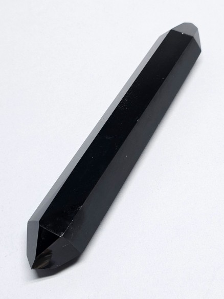 Punta pulida biterminada de obsidiana