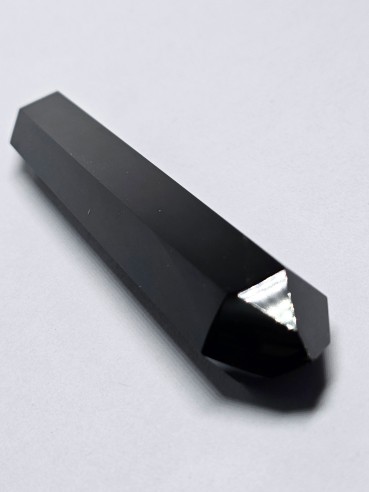 Punta pulida biterminada de obsidiana