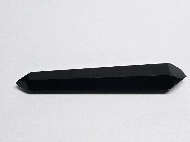Punta pulida biterminada de obsidiana