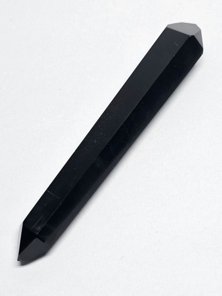 Punta pulida biterminada de obsidiana