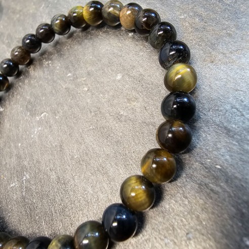Pulsera de bola de ojo de buey de 8mm. Elegancia mineral