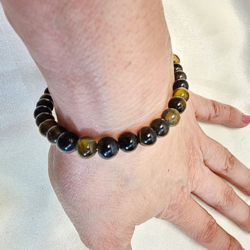 Pulsera de bola de ojo de buey de 8mm. Elegancia mineral