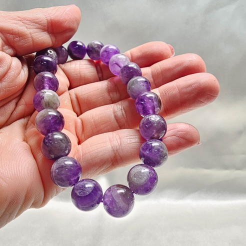 Pulsera de bola de amatista de 10mm. Elegancia mineral