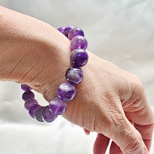 Pulsera de bola de amatista de 10mm. Elegancia mineral