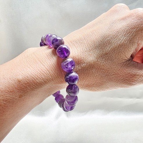 Pulsera de bola de amatista de 10mm. Elegancia mineral