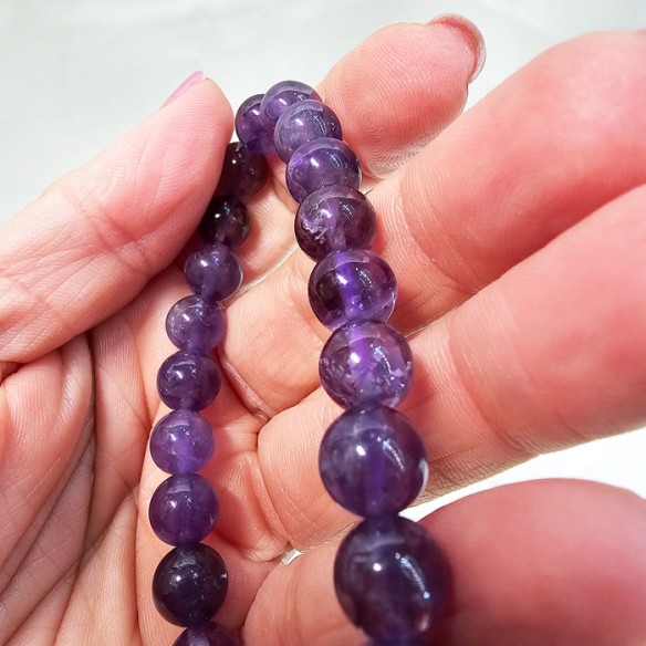 Pulsera de bola de amatista de 10mm. Elegancia mineral