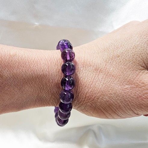 Pulsera de bola de amatista de 10mm. Elegancia mineral
