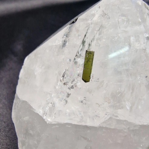 Polished quartz point with green tourmaline, pure harmony