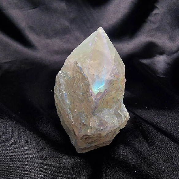 Punta pulida de cuarzo aura