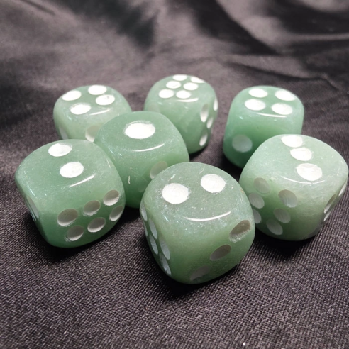 Green aventurine die flowing in harmony and well-being