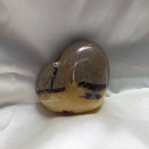 Septarian heart. Cracks formed over time by the Earth