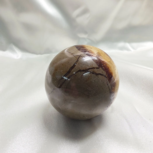 Septarian sphere. Cracks formed over time by the Earth