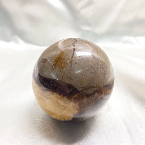 Septarian sphere. Cracks formed over time by the Earth