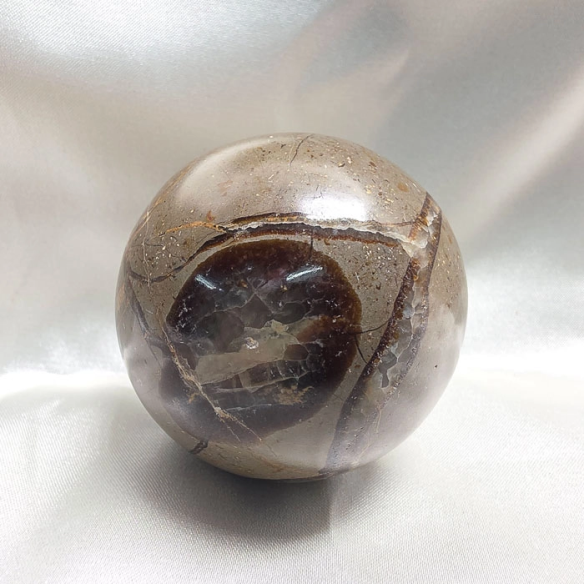 Septarian sphere. Cracks formed over time by the Earth