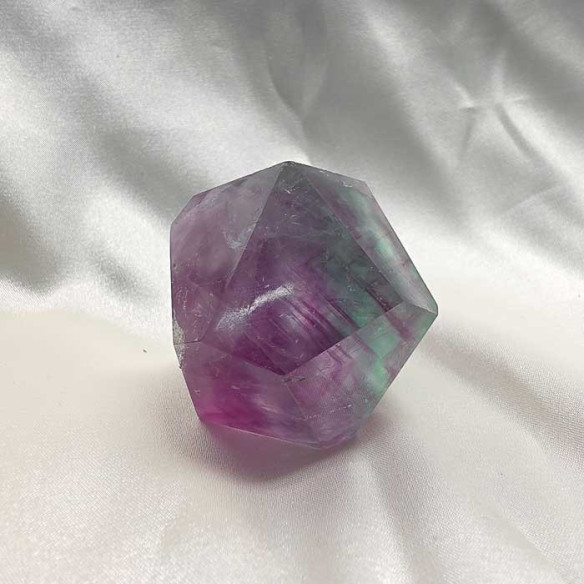 Fluorite polished polyhedron. Mental clarity