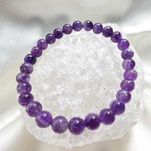 Amatista brazalete bola lisa 6mm. Fuerza y vitalidad.