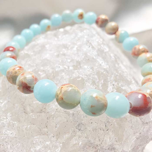 Ópalo andino brazalete bola lisa 6mm. Fuerza y intensidad.