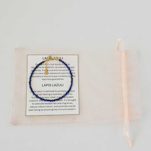 Lapis lazuli bracelet with bilingual CAT/ENG ESP/ENG property card and organza bag