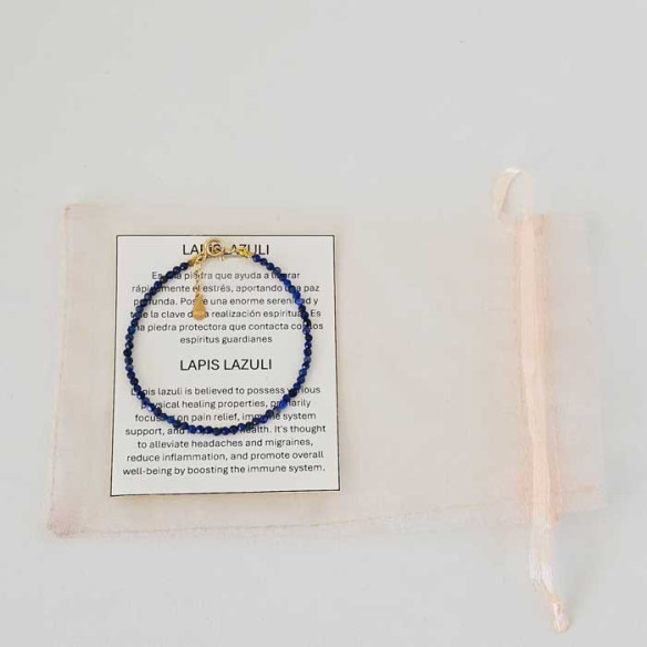 Lapis lazuli bracelet with bilingual CAT/ENG ESP/ENG property card and organza bag